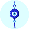 Blue and white evil eye charm on light blue background